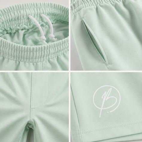 A four-panel close-up collage of mint green athletic shorts, showing the elastic waistband with white drawstrings, a side pocket, the leg opening, and a white script logo on the thigh.